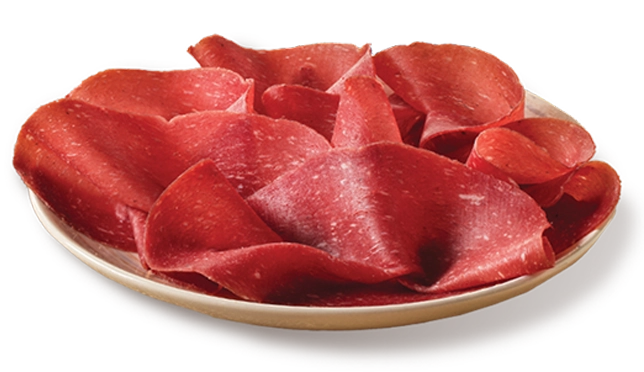 Bresì Golfera di manzo, bresaola di manzo su un piatto con olio limone e sale